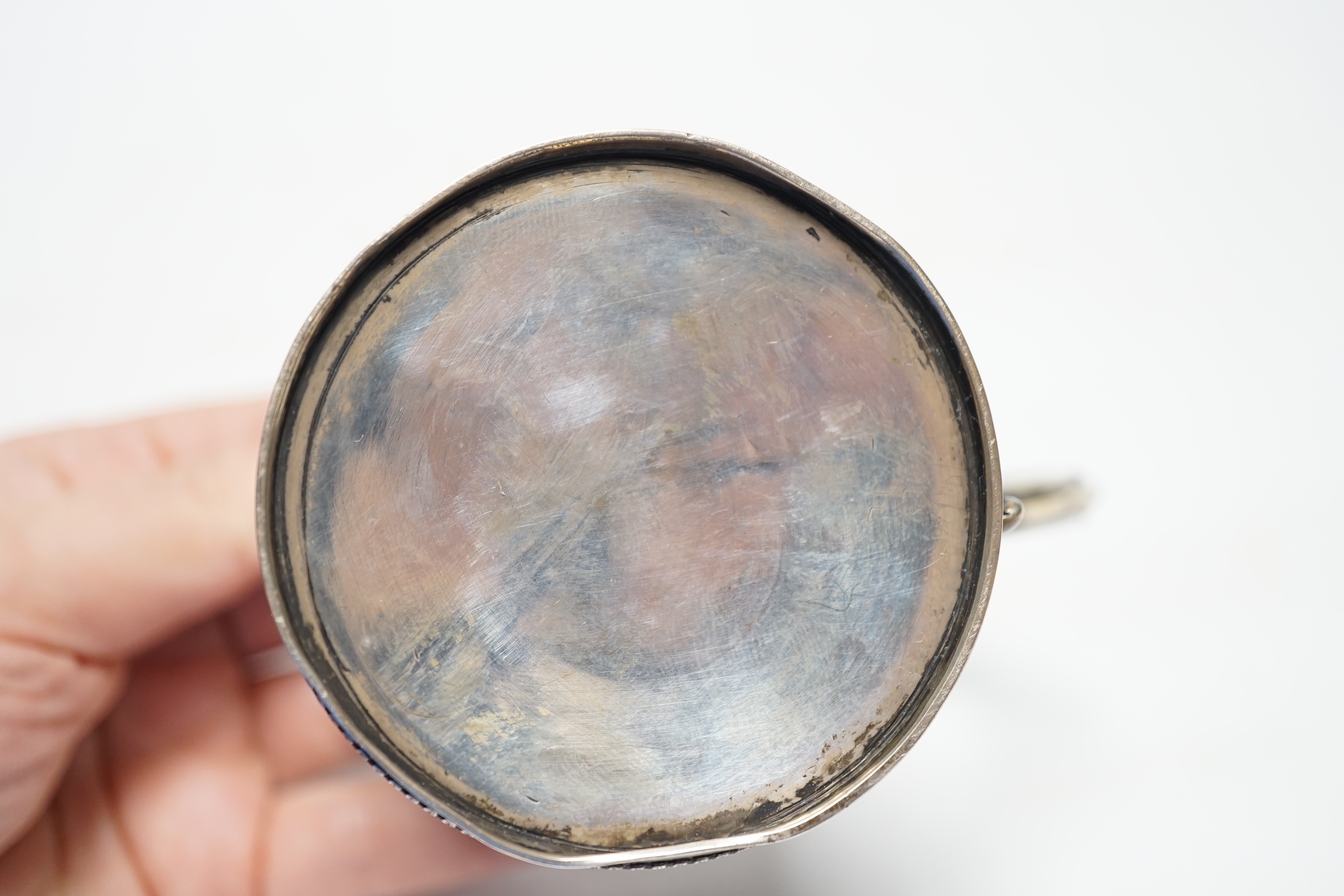 A Victorian engraved silver christening mug, Henry Holland, London, 1866, 87mm, 117 grams.